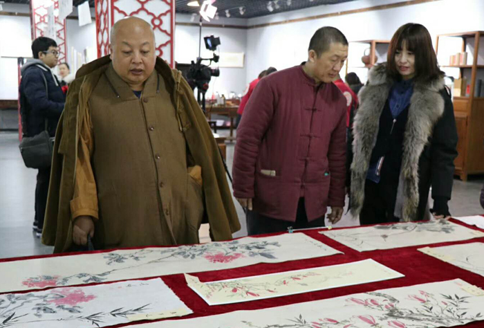 关注孤寡残冬至献爱心真广法师杨东彪孙立琨举行书画慈善义卖活动